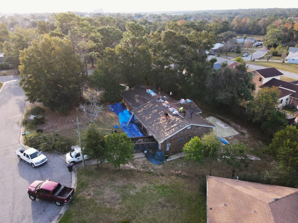 High Altitude Picture of Roof Work Being done On house